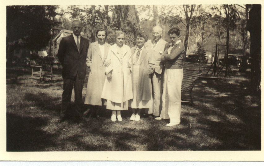 Ken Brown was ten years younger than his only other sibling and grew up in Glen Ellyn, Illinois, somewhat like an only child. His father, William, stands at the far left and his mother, Pearl, is in the middle. (credit: Brown Family)
