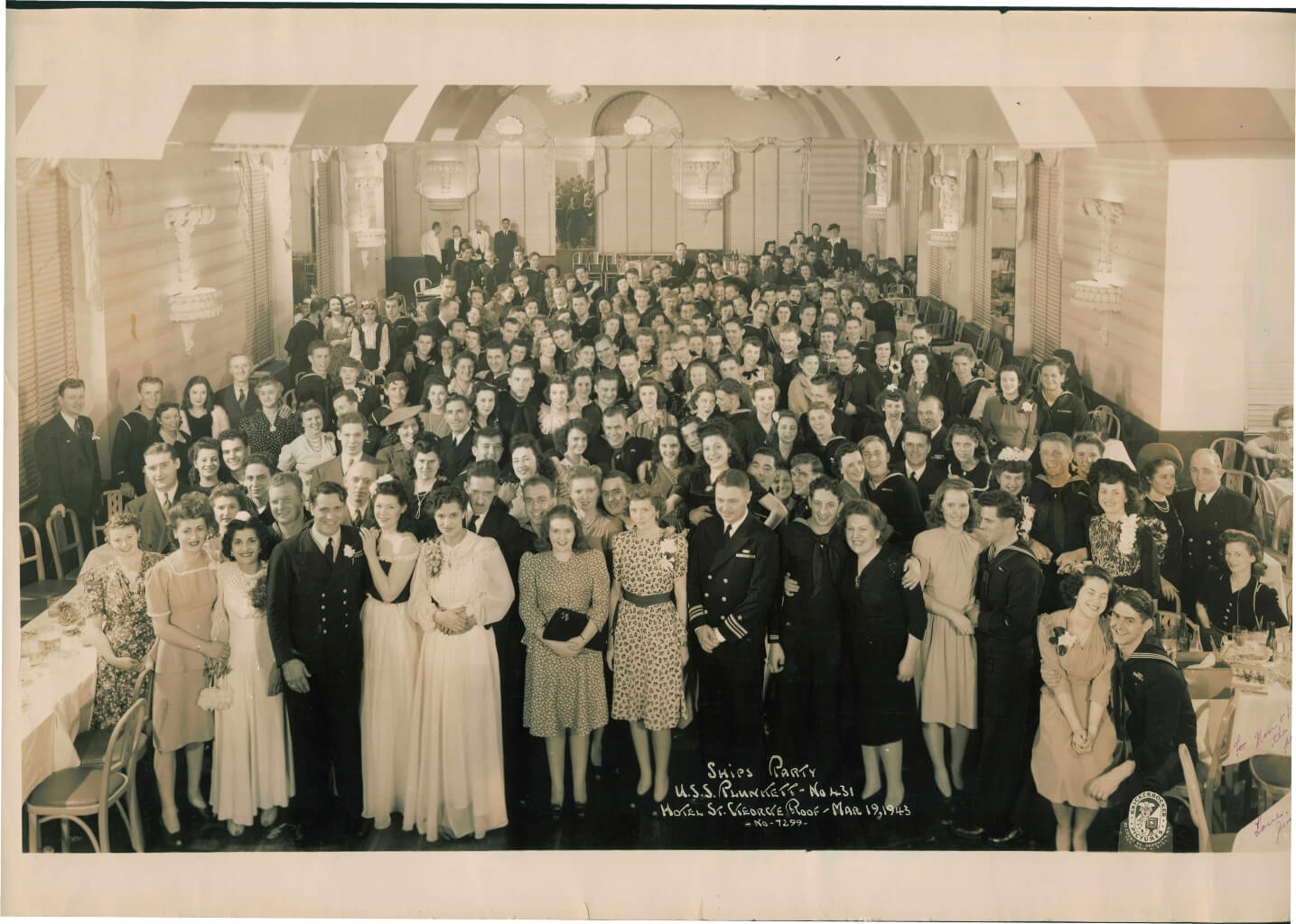 Plunkett had three parties at the Hotel St. George in Brooklyn, one in December 1942, this one on March 19, 1943 and the last one in March 1944. Captain Burke is front and center with his wife Adele. Dutch Heissler is to the left with Ginny. John Gallagher is two rows behind Burke, peeking out from behind some big hair. Jim Feltz is halfway to the rear at the far right. Irv Gebhart is four places to Jim’s right. (credit: Jim Feltz)